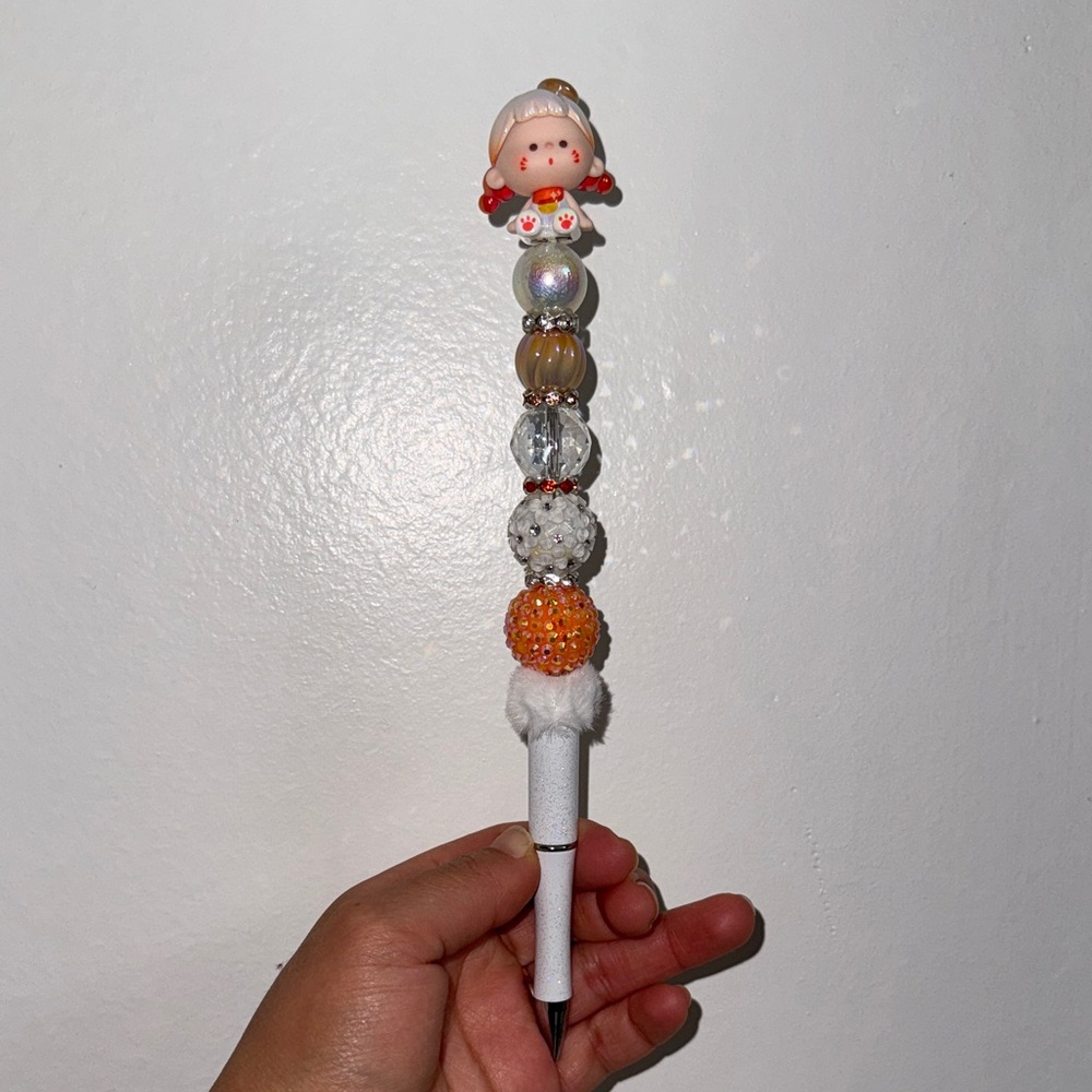 Girl beaded pen